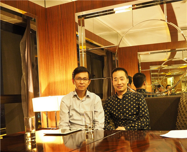 浦君总经理胡桂忠与中国美术家协会副主席何家英合影